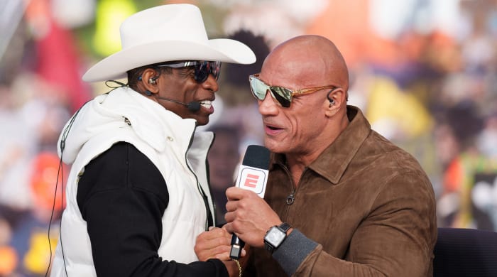 Deion Sanders meeting The Rock.
